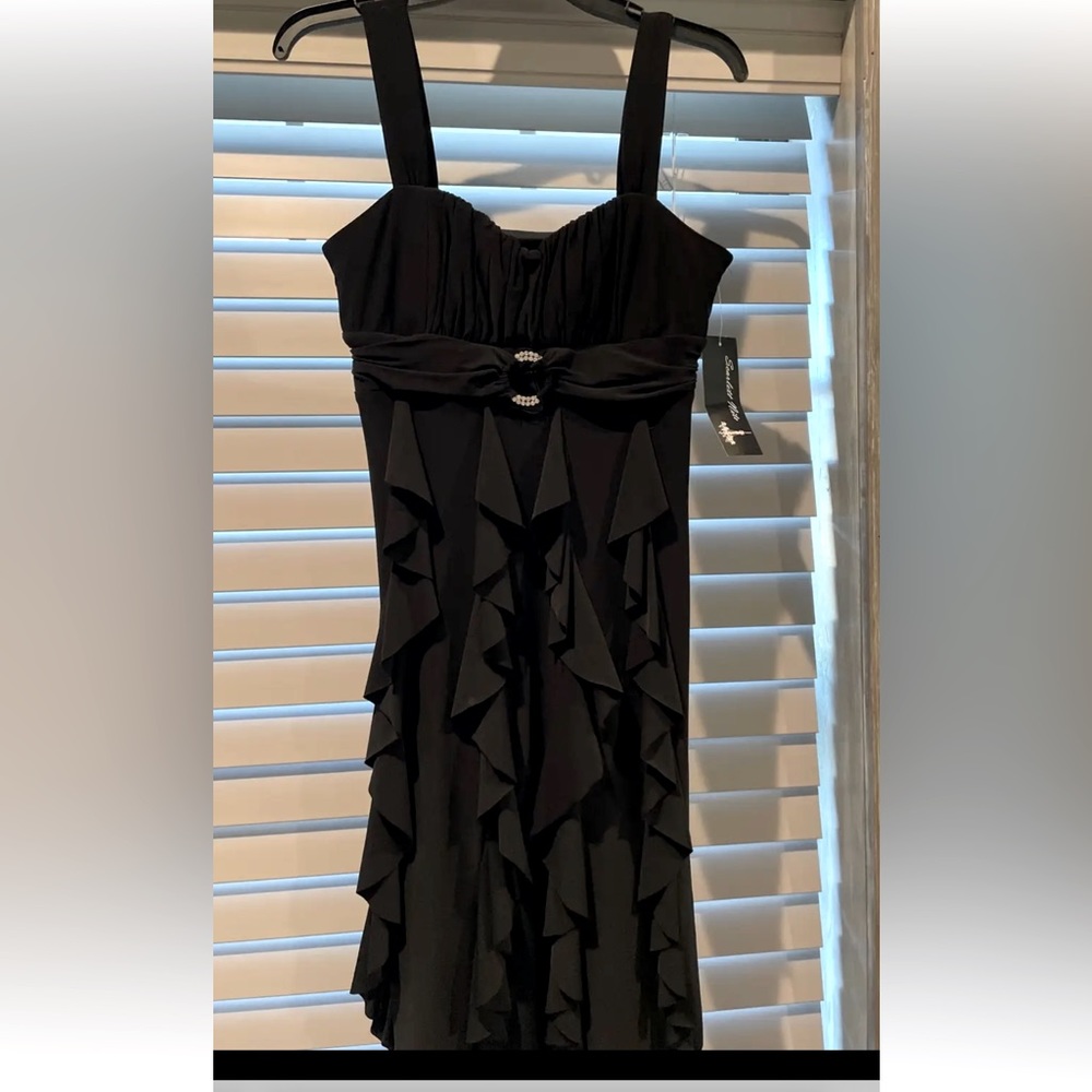 Black social dress- never been worn- still has tags on it